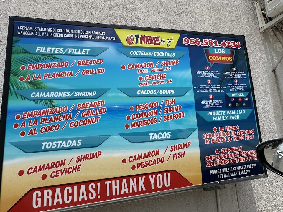 Printed menu showing shrimp, fillet, and tostadas.
